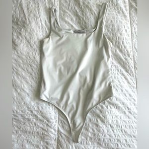 White thong bodysuit